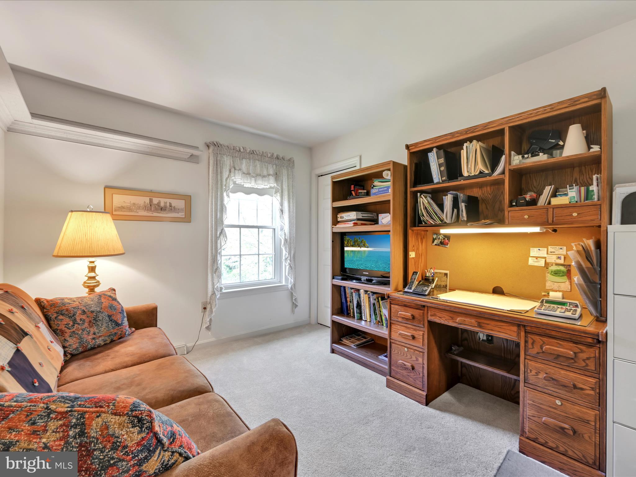 29 Church Road Lancaster, PA 17603 - Photo 35 of 64 a bedroom with furniture and a lamp