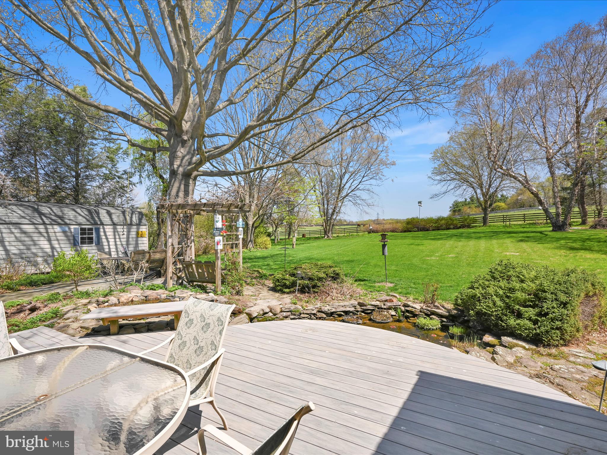 29 Church Road Lancaster, PA 17603 - Photo 41 of 64 a view of a patio with a table chairs and a yard