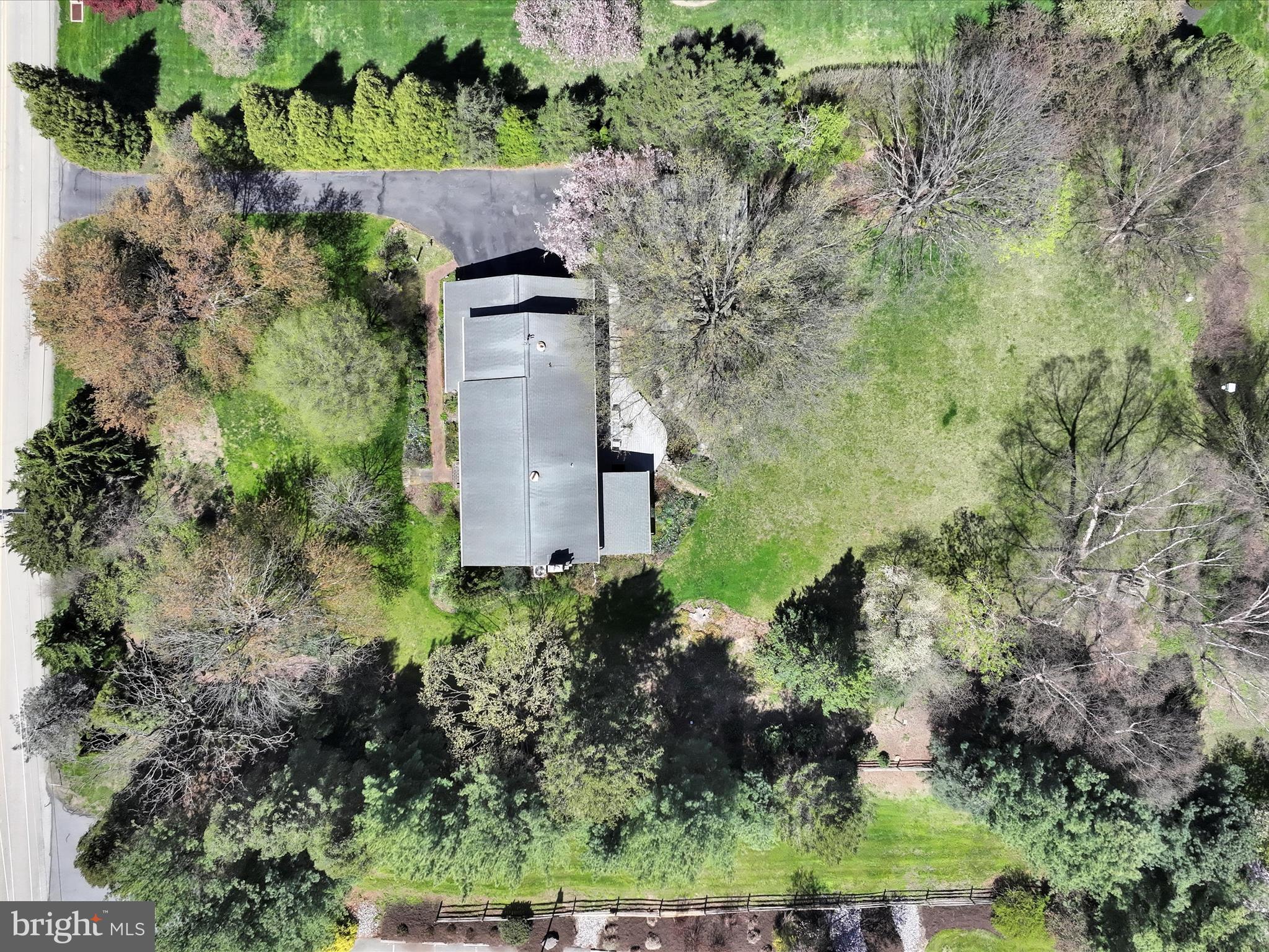 29 Church Road Lancaster, PA 17603 - Photo 51 of 64 an aerial view of a house with a yard and large tree