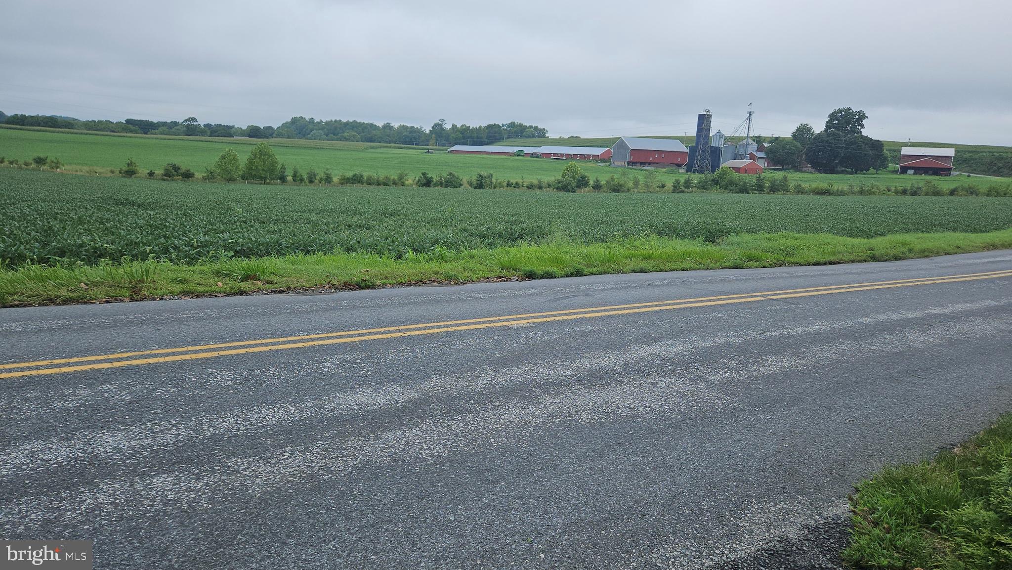 29 Church Road Lancaster, PA 17603 - Photo 52 of 64 a view of a green field with houses in the background