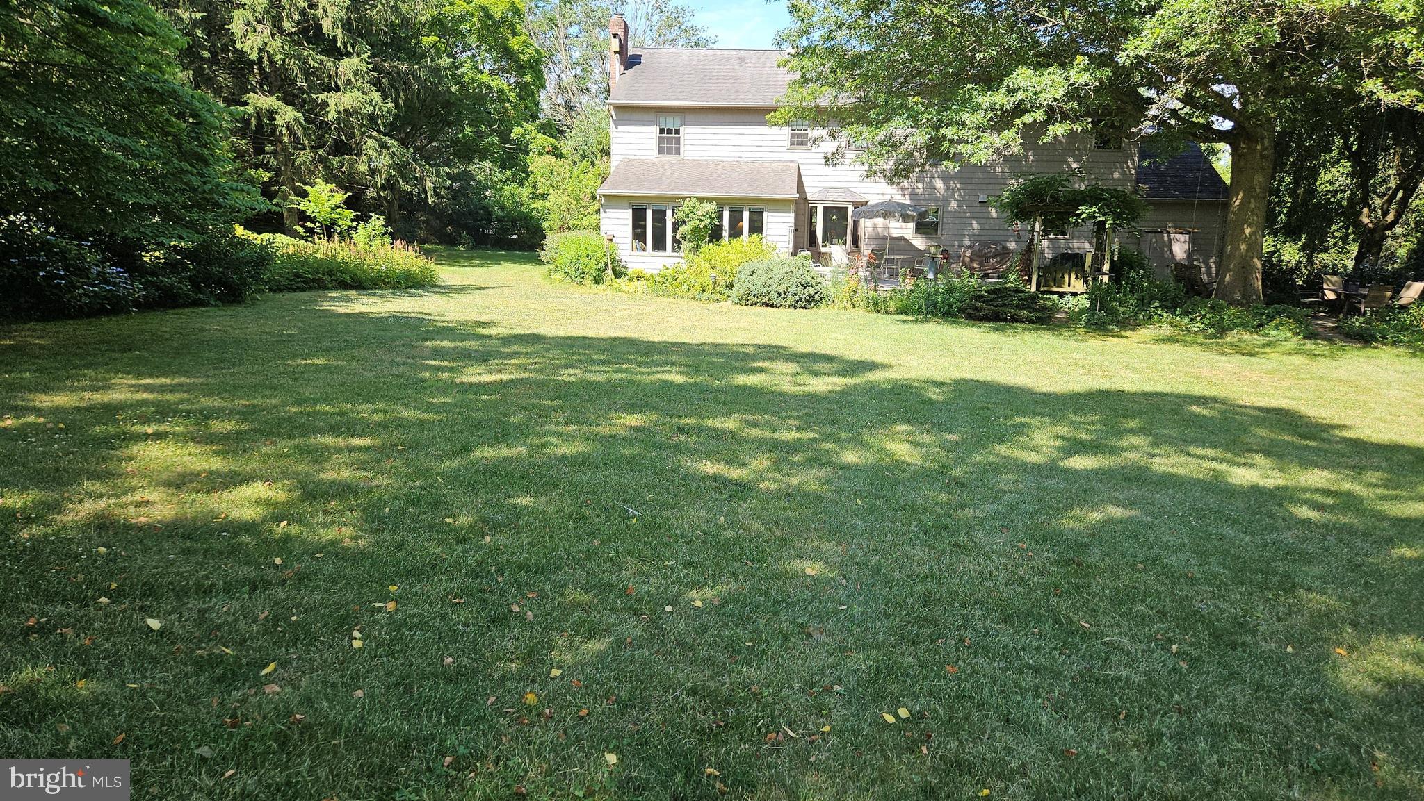 29 Church Road Lancaster, PA 17603 - Photo 53 of 64 a view of a big yard with plants and large trees