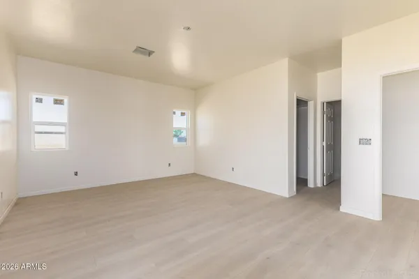 an empty room with windows