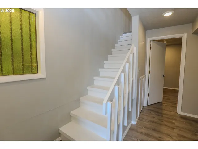 a view of entryway with wooden floor