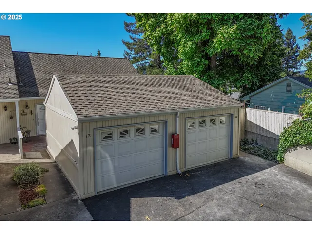 a aerial view of a house with a yard