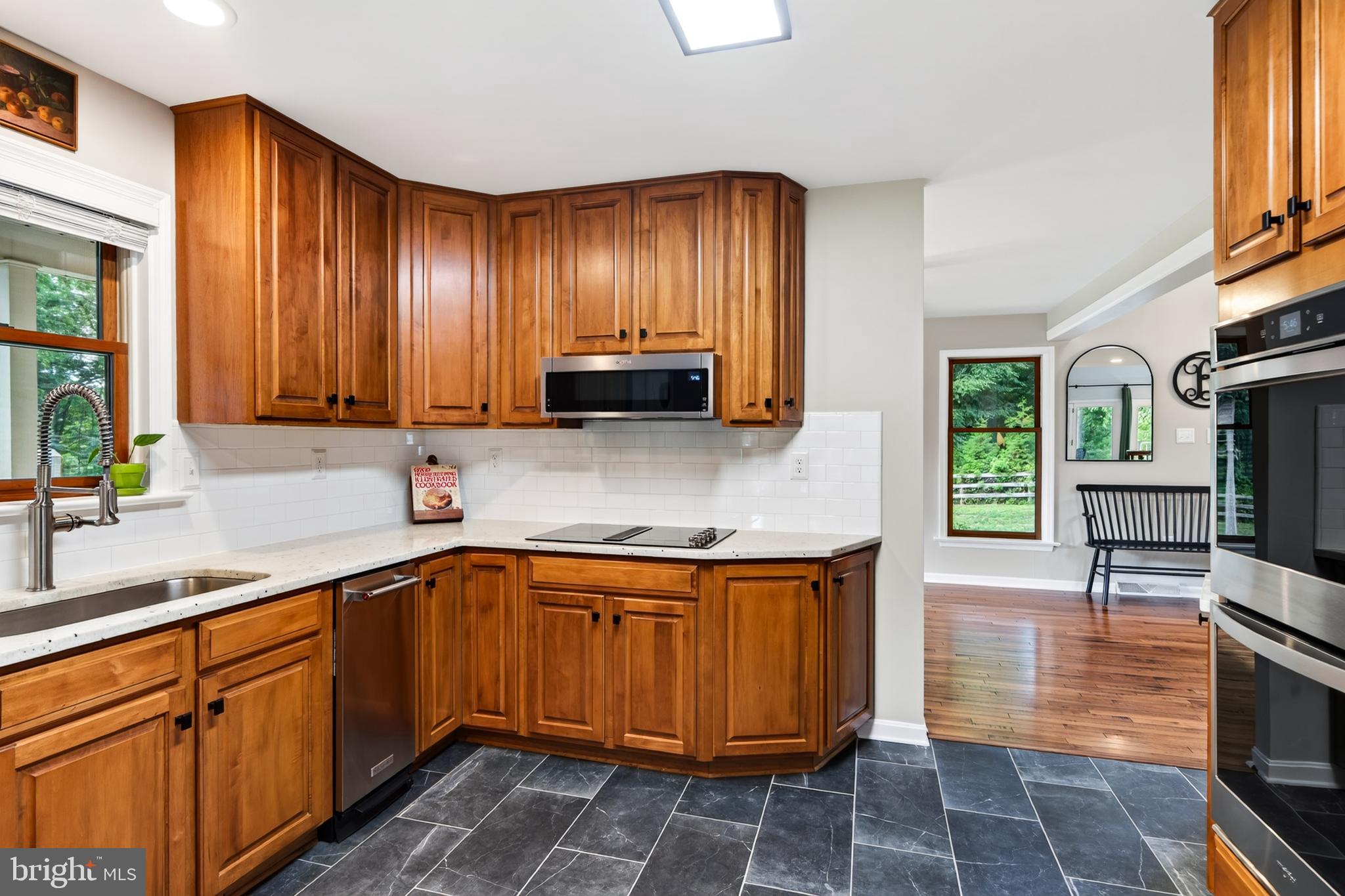 435 Kirks Mill Road Nottingham, PA 19362 - Photo 23 of 77 Maple cabinet with tile floor