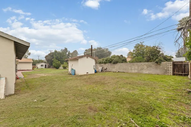 a bathroom with a sink and a yard