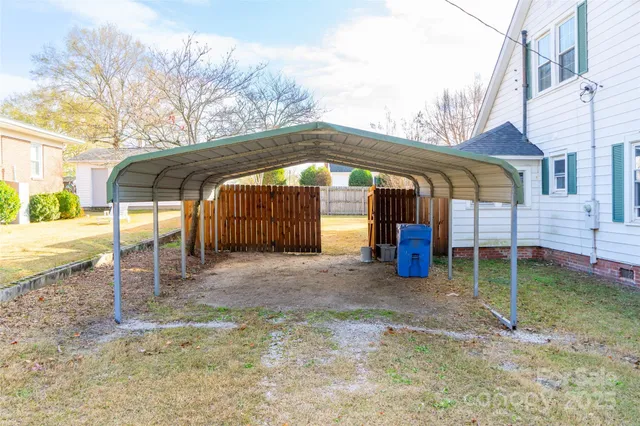 a aerial view of a house with swimming pool
