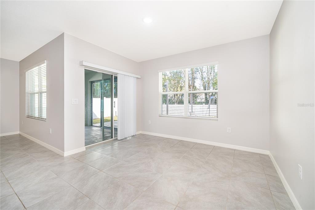 3102 Bethpage Loop Mount Dora, FL 32757 - Photo 15 of 29 an empty room with windows