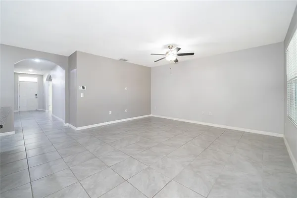 an empty room with a bathroom