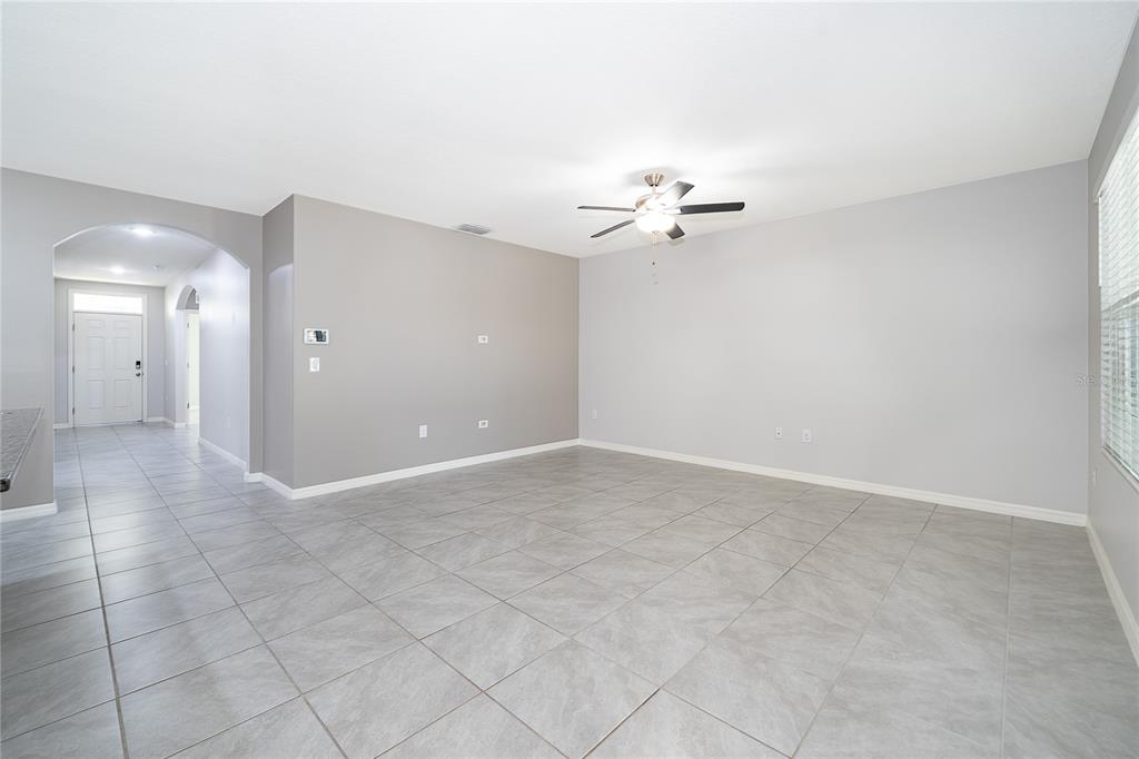 3102 Bethpage Loop Mount Dora, FL 32757 - Photo 16 of 29 an empty room with a bathroom
