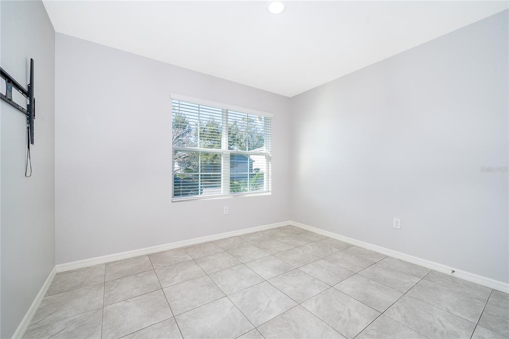 3102 Bethpage Loop Mount Dora, FL 32757 - Photo 21 of 29 an empty room with windows