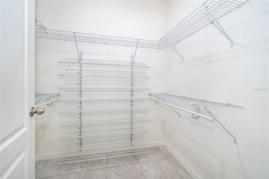 3102 Bethpage Loop Mount Dora, FL 32757 - Photo 24 of 29 a bathroom with a shower