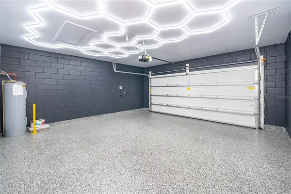 a view of room that has a ceiling fan