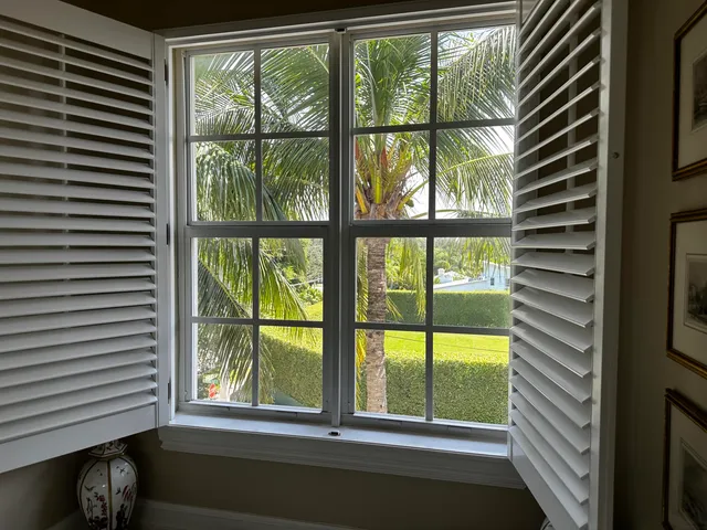 a view of a room that has a large window