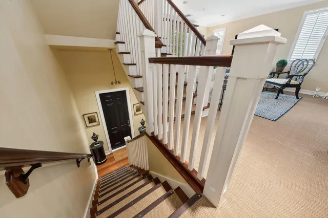 a view of stairs and furniture