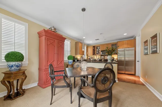 a view of a dining room with furniture window and outside view