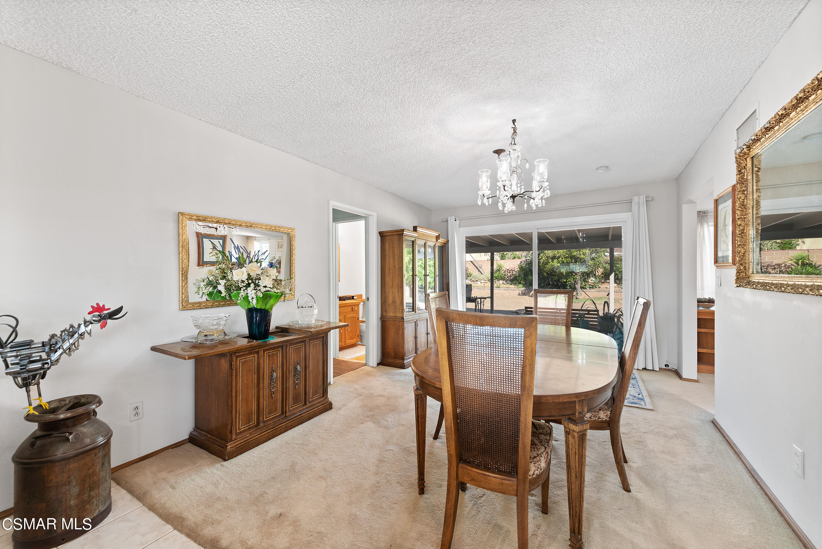 3291 Travis Avenue Simi Valley, CA 93063 - Photo 14 of 54 a view of a dining room with furniture window and outside view