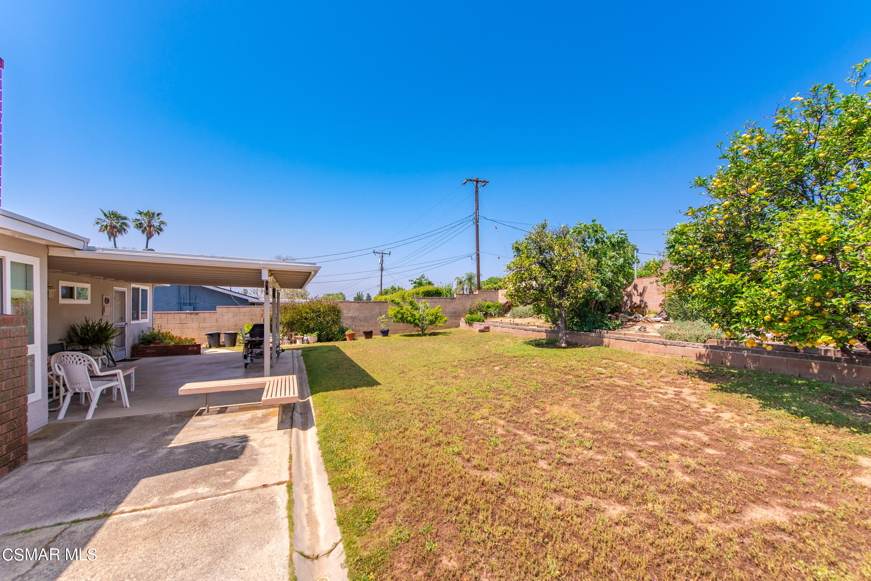3291 Travis Avenue Simi Valley, CA 93063 - Photo 38 of 54 a swimming pool with outdoor seating and yard