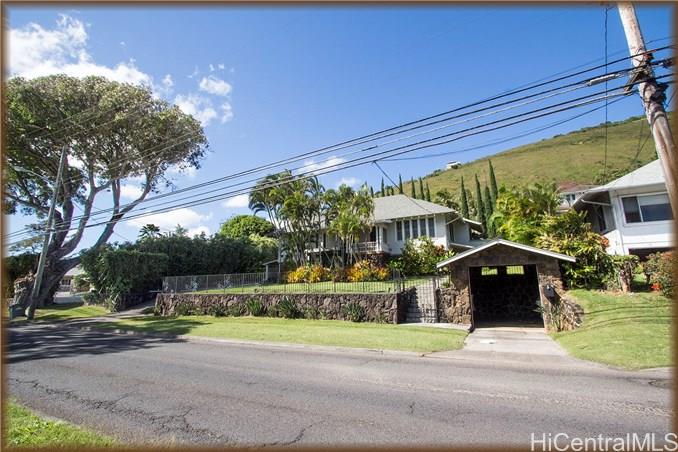 2416 Manoa Road Honolulu, HI 96822 - Photo 1 of 1 a front view of a house with a yard