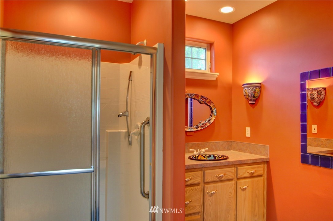 17566 Dunbar Road Mount Vernon, WA 98273 - Photo 17 of 40 a bathroom with a shower and a sink