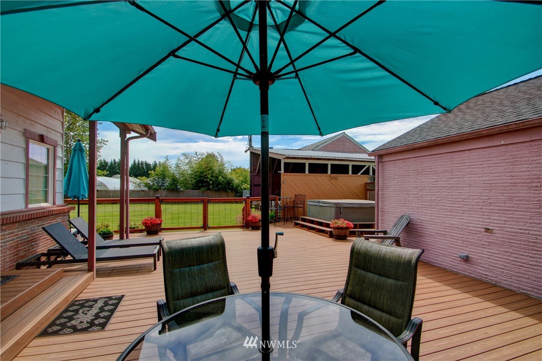 17566 Dunbar Road Mount Vernon, WA 98273 - Photo 21 of 40 a patio with patio outdoor seating and yard