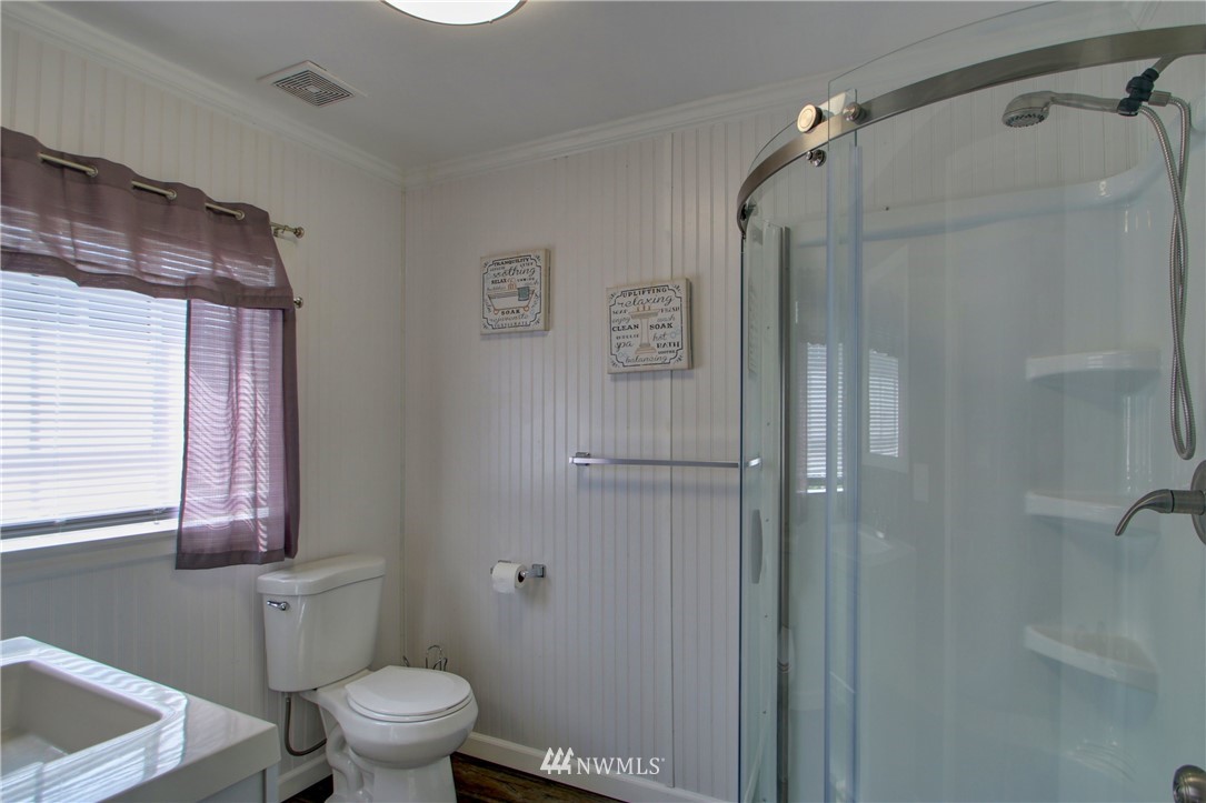 17566 Dunbar Road Mount Vernon, WA 98273 - Photo 28 of 40 a bathroom with a toilet and a shower