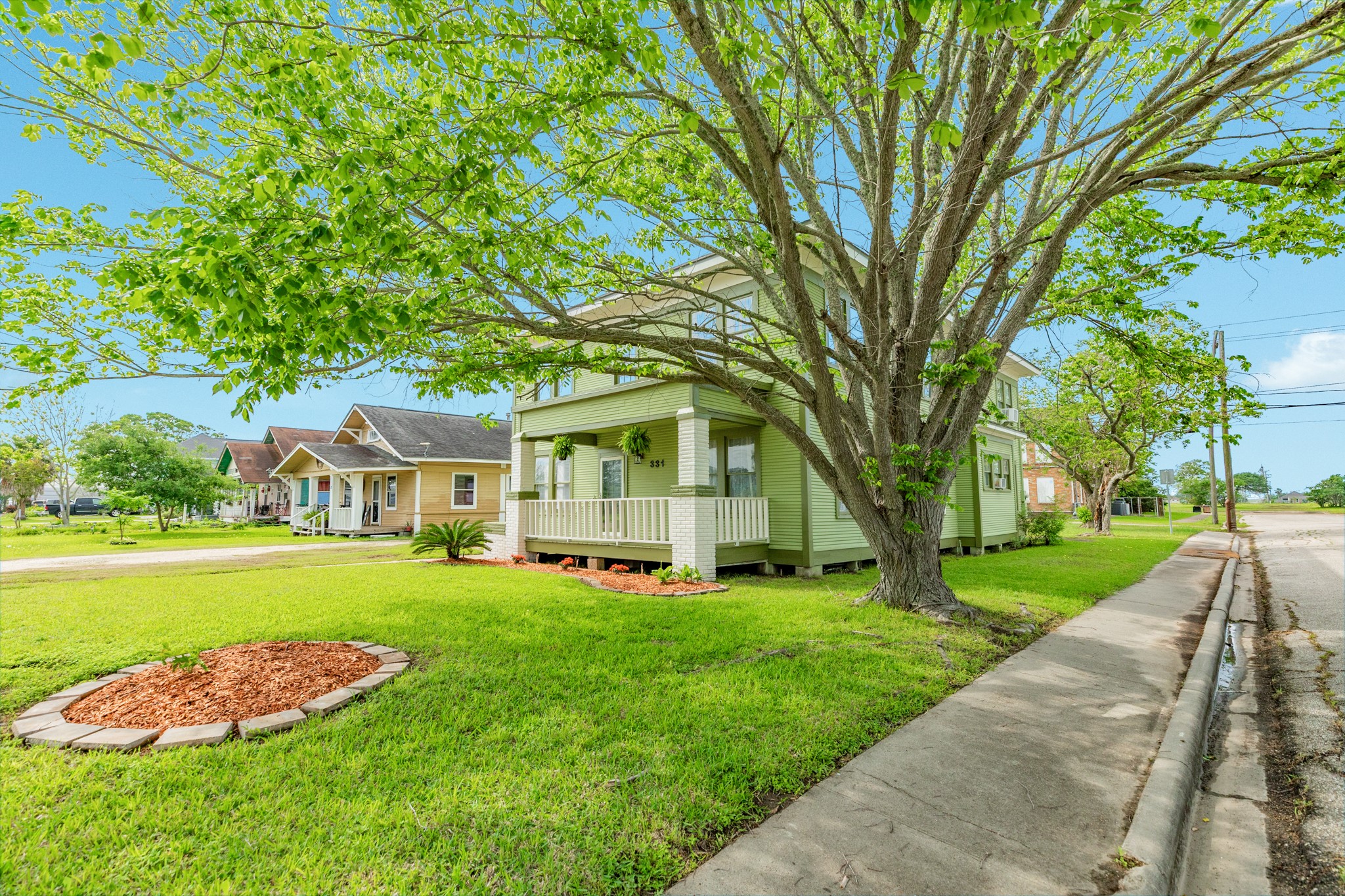 331 West Broad Street Freeport, TX 77541 - Photo 30 of 31 a front view of a house with a yard