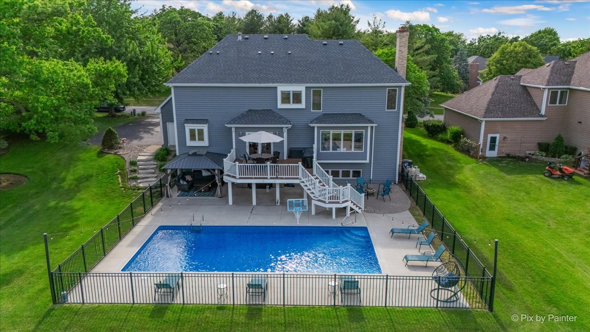 7104 Dove Way Cary, IL 60013 - Photo 81 of 82 a aerial view of a house with porch and a yard