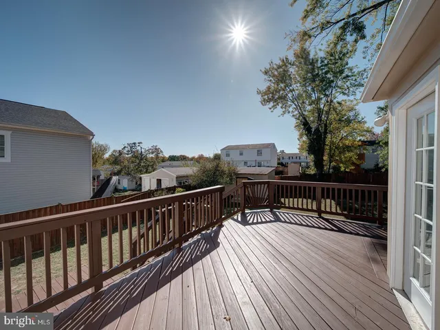 a view of balcony with furniture