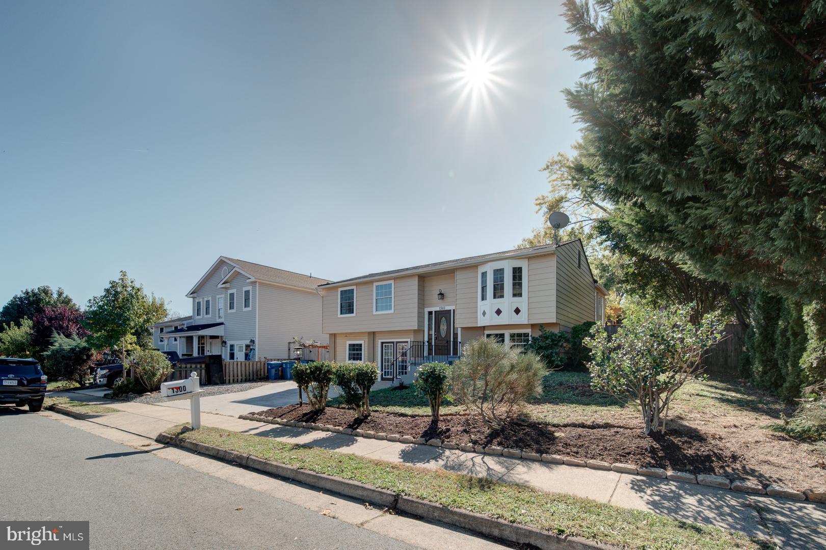 1300 East Beech Road Sterling, VA 20164 - Photo 34 of 35 a view of a house with backyard and sitting area