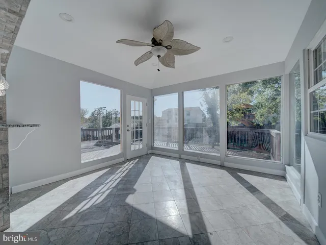 a view of a room with a large window