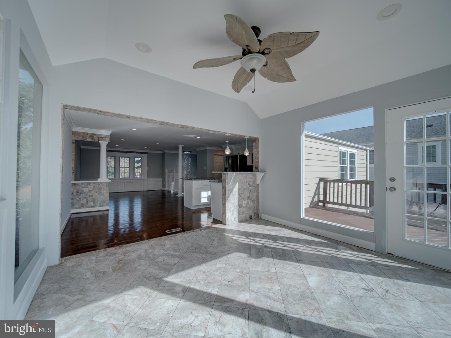 1300 East Beech Road Sterling, VA 20164 - Photo 10 of 35 a living room with furniture and a ceiling fan