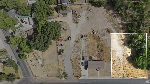 426 North Locust Avenue Lindon, UT 84042 - Photo 4 of 9 Aerial perspective showcasing extensive land with a single-story residence featuring a dark-toned roof