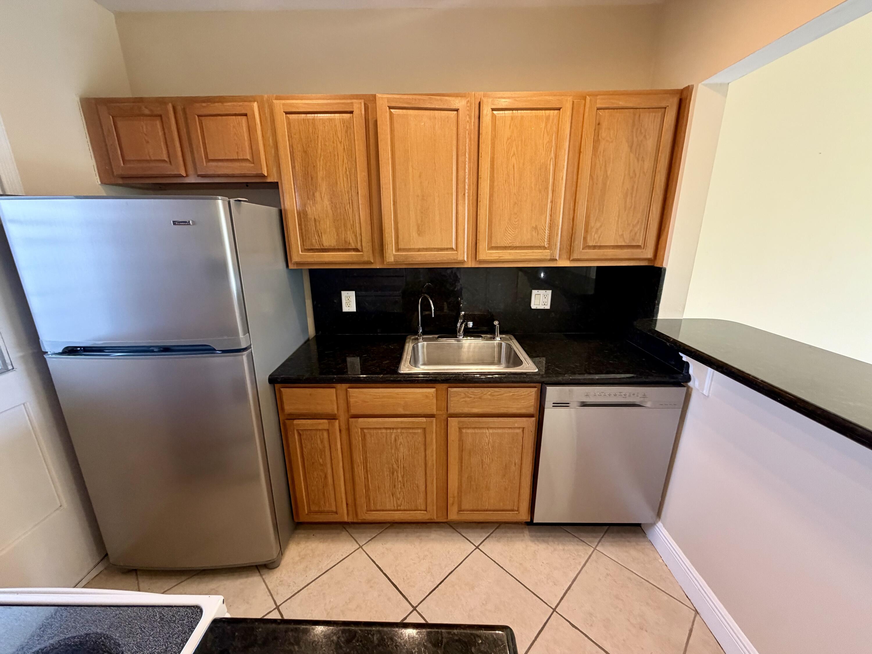 5601 Northwest 2nd Avenue, Unit 326 Boca Raton, FL 33487 - Photo 2 of 12 Kitchen 1