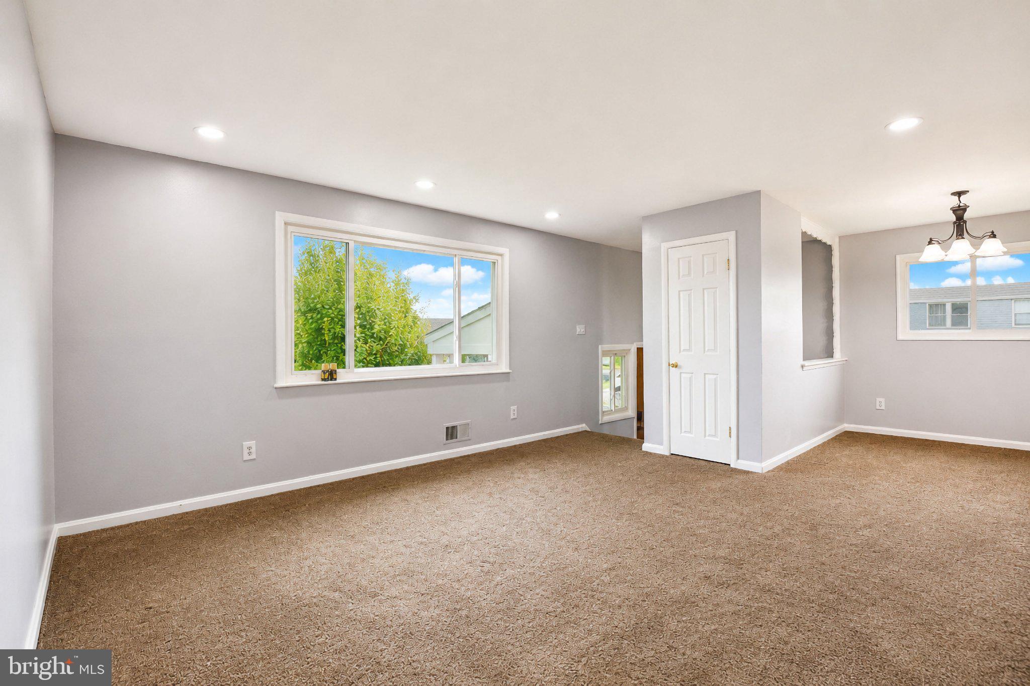 5712 Ash Drive Springfield, VA 22150 - Photo 6 of 38 Bright and airy open space awaits.