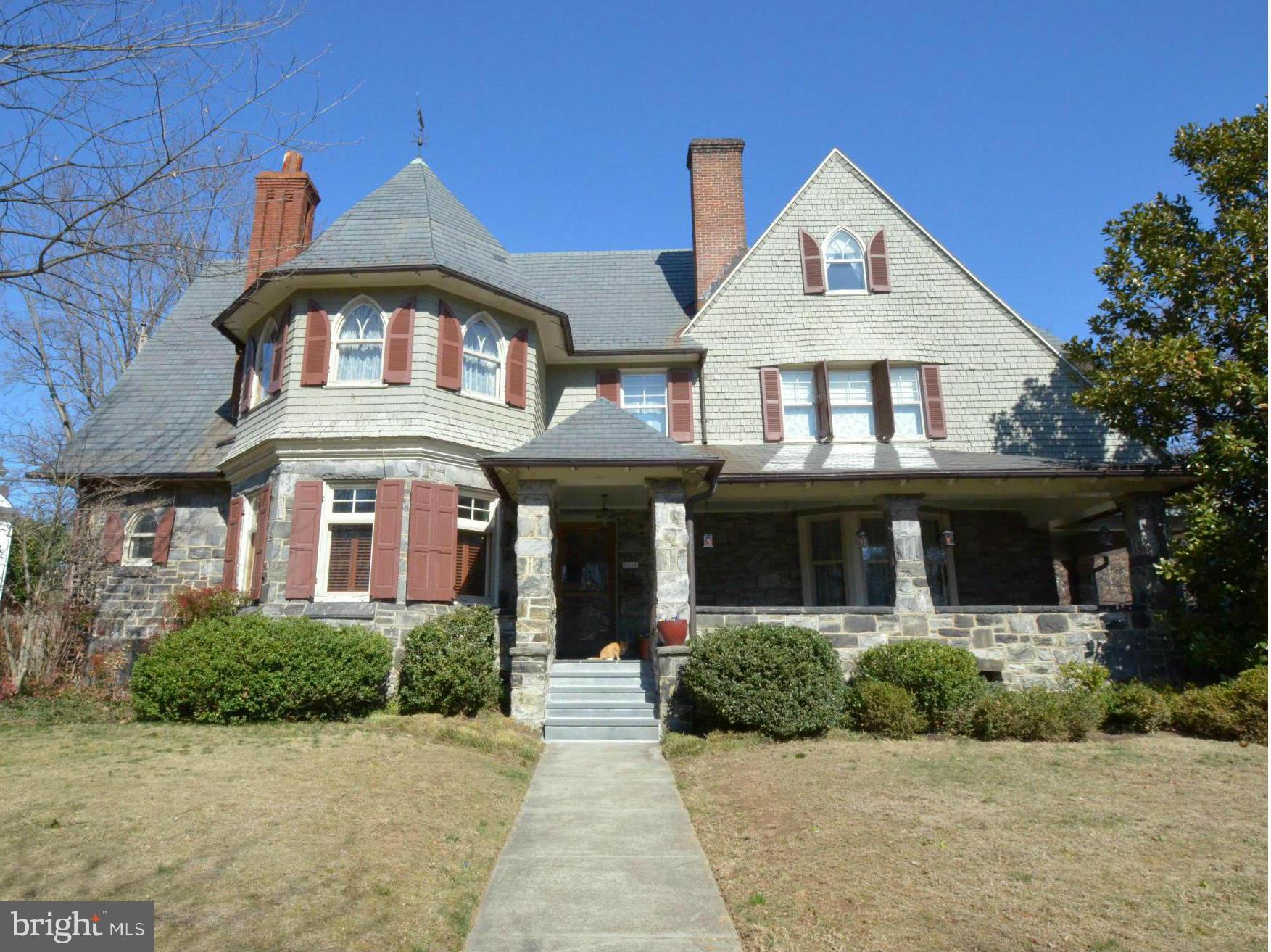 311 Oakdale Road Baltimore, MD 21210 - Photo 1 of 26 a front view of a house with a yard