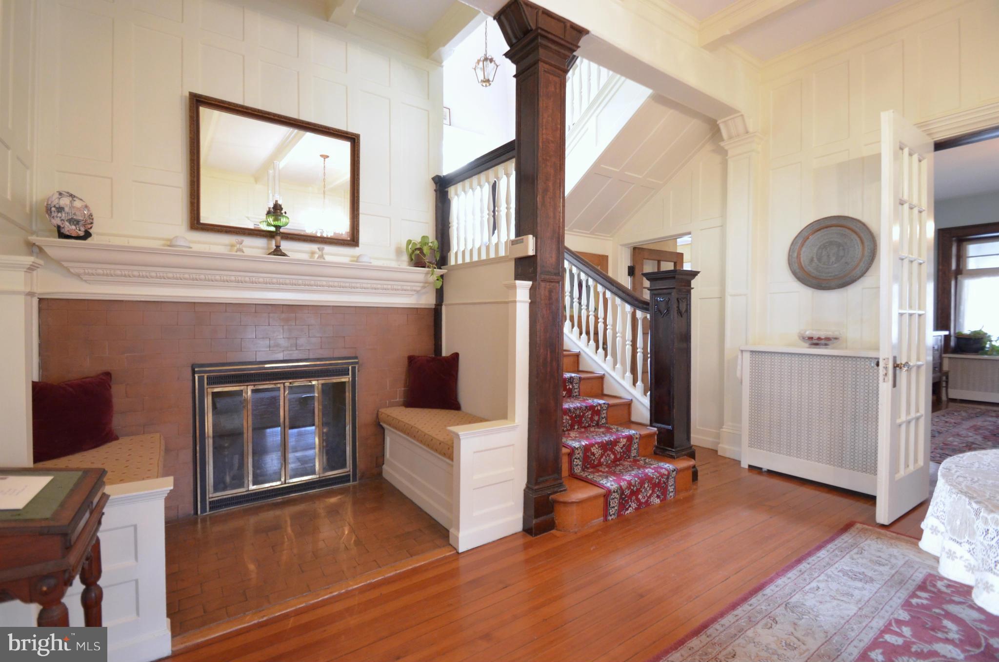 311 Oakdale Road Baltimore, MD 21210 - Photo 2 of 26 a living room with furniture and a fireplace