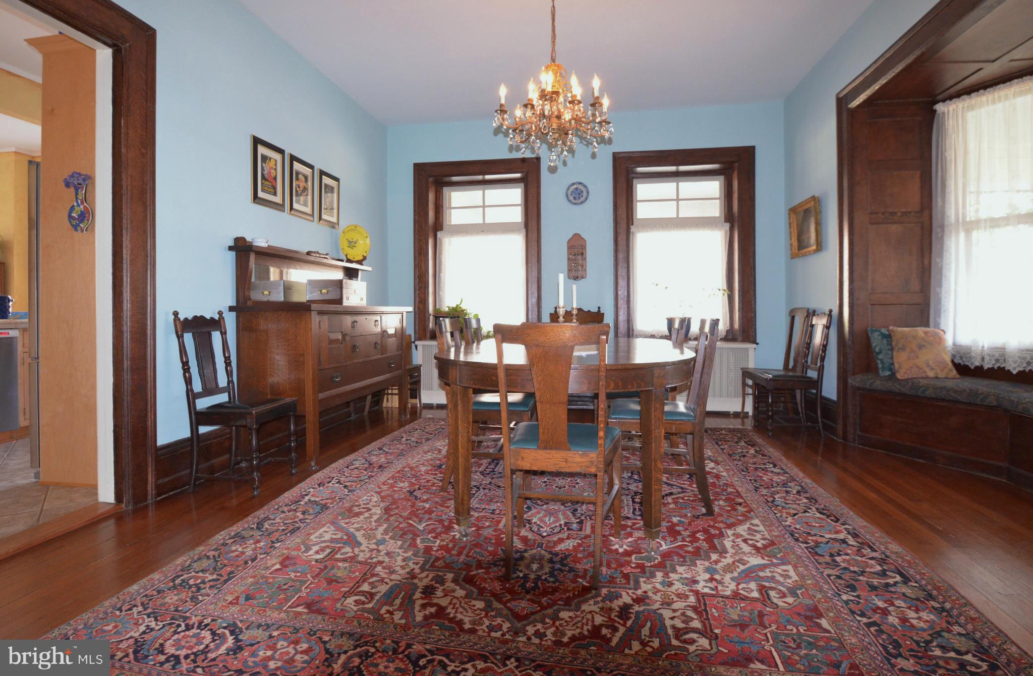 311 Oakdale Road Baltimore, MD 21210 - Photo 11 of 26 a view of a dining room with furniture window and wooden floor
