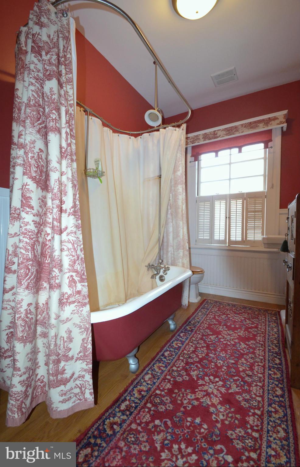 311 Oakdale Road Baltimore, MD 21210 - Photo 20 of 26 a view of a room with window and wooden floor