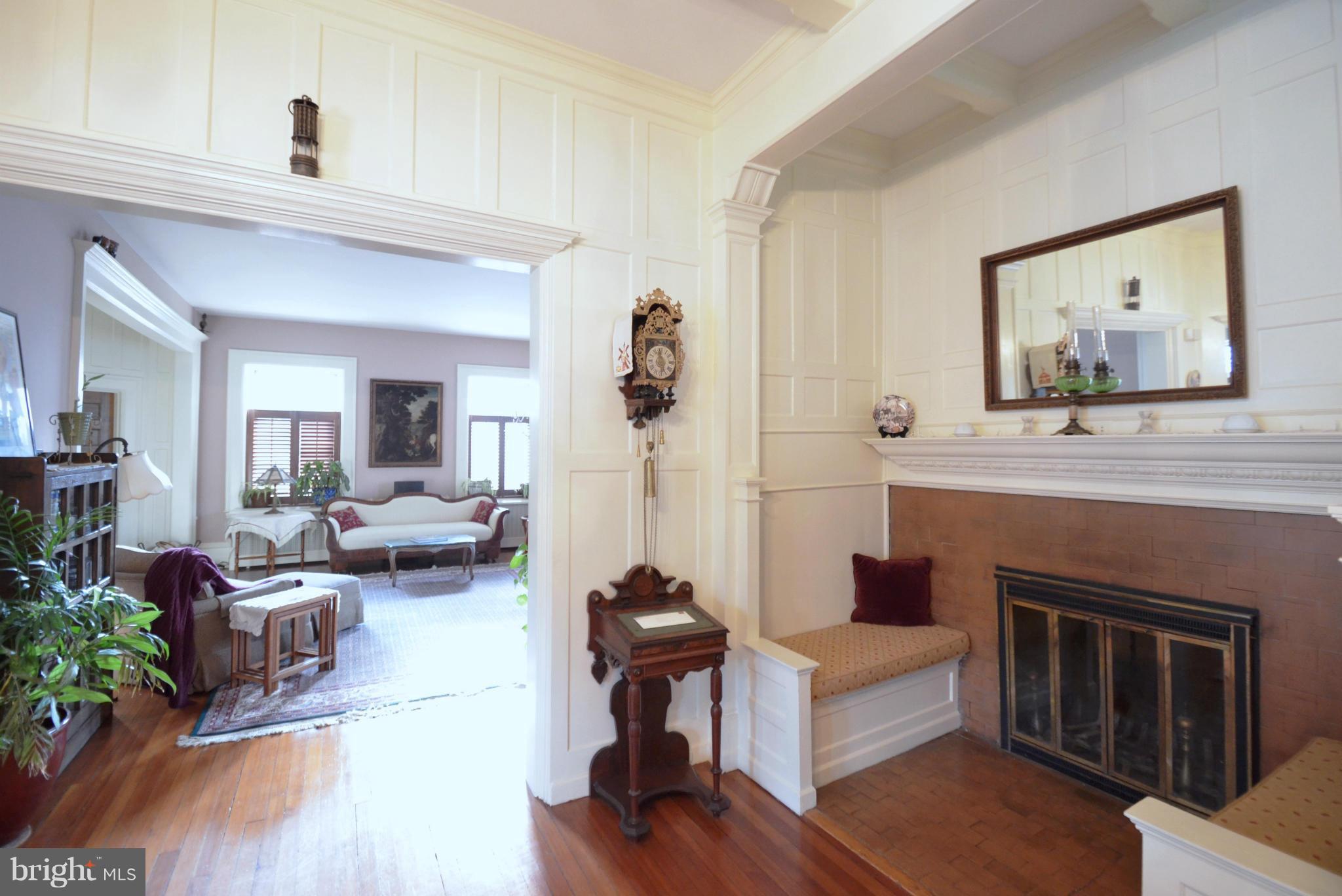311 Oakdale Road Baltimore, MD 21210 - Photo 3 of 26 a living room with furniture and a fireplace