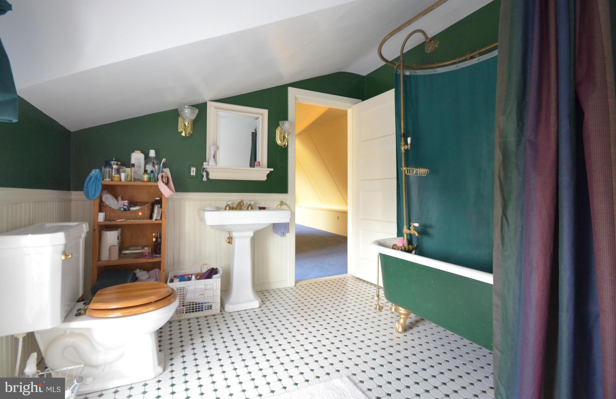 311 Oakdale Road Baltimore, MD 21210 - Photo 26 of 26 a bathroom with a sink toilet and shower