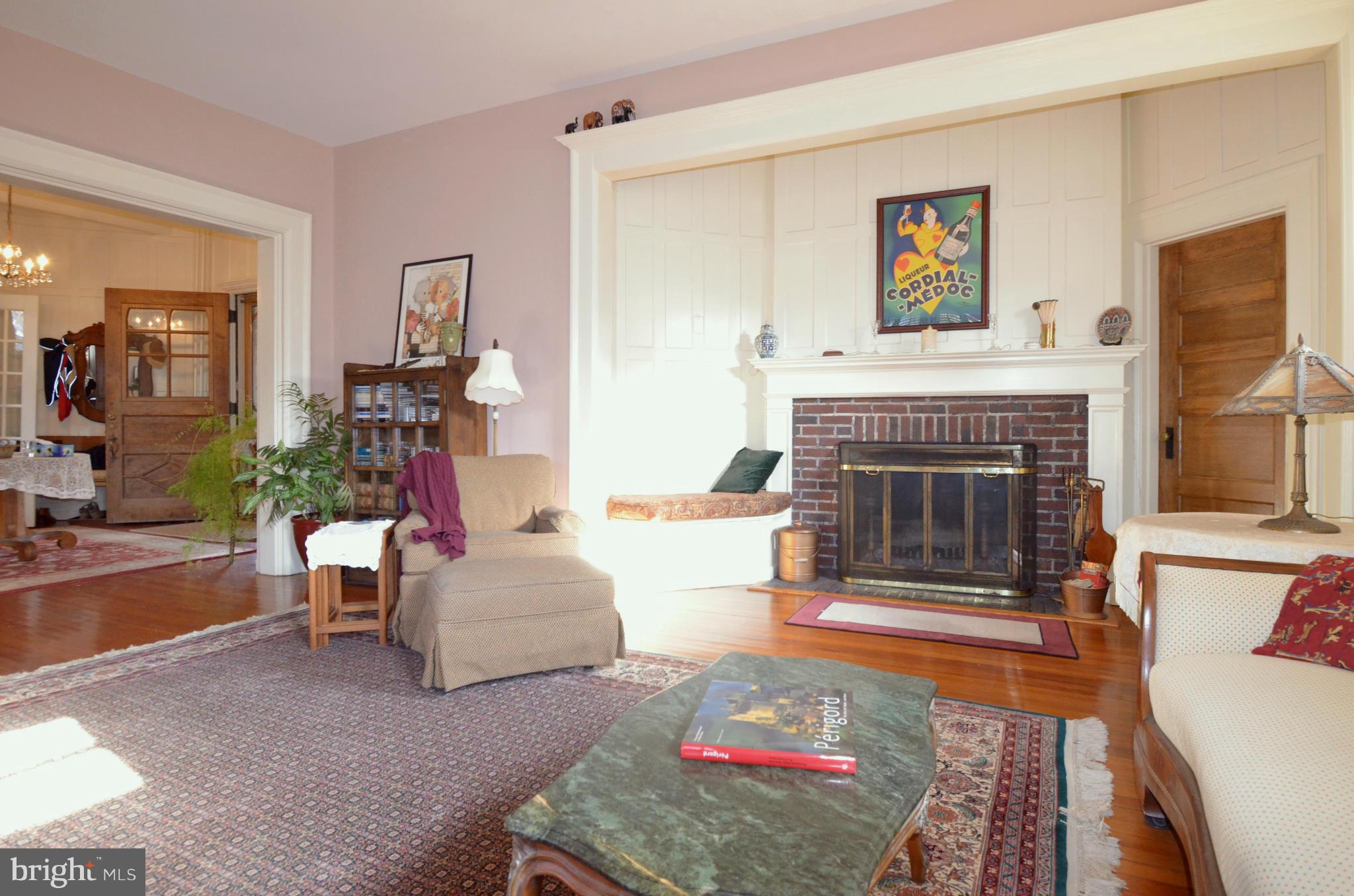 311 Oakdale Road Baltimore, MD 21210 - Photo 6 of 26 a living room with furniture and a fireplace