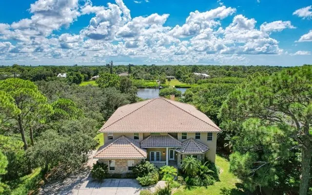 a view of a garden with a houses