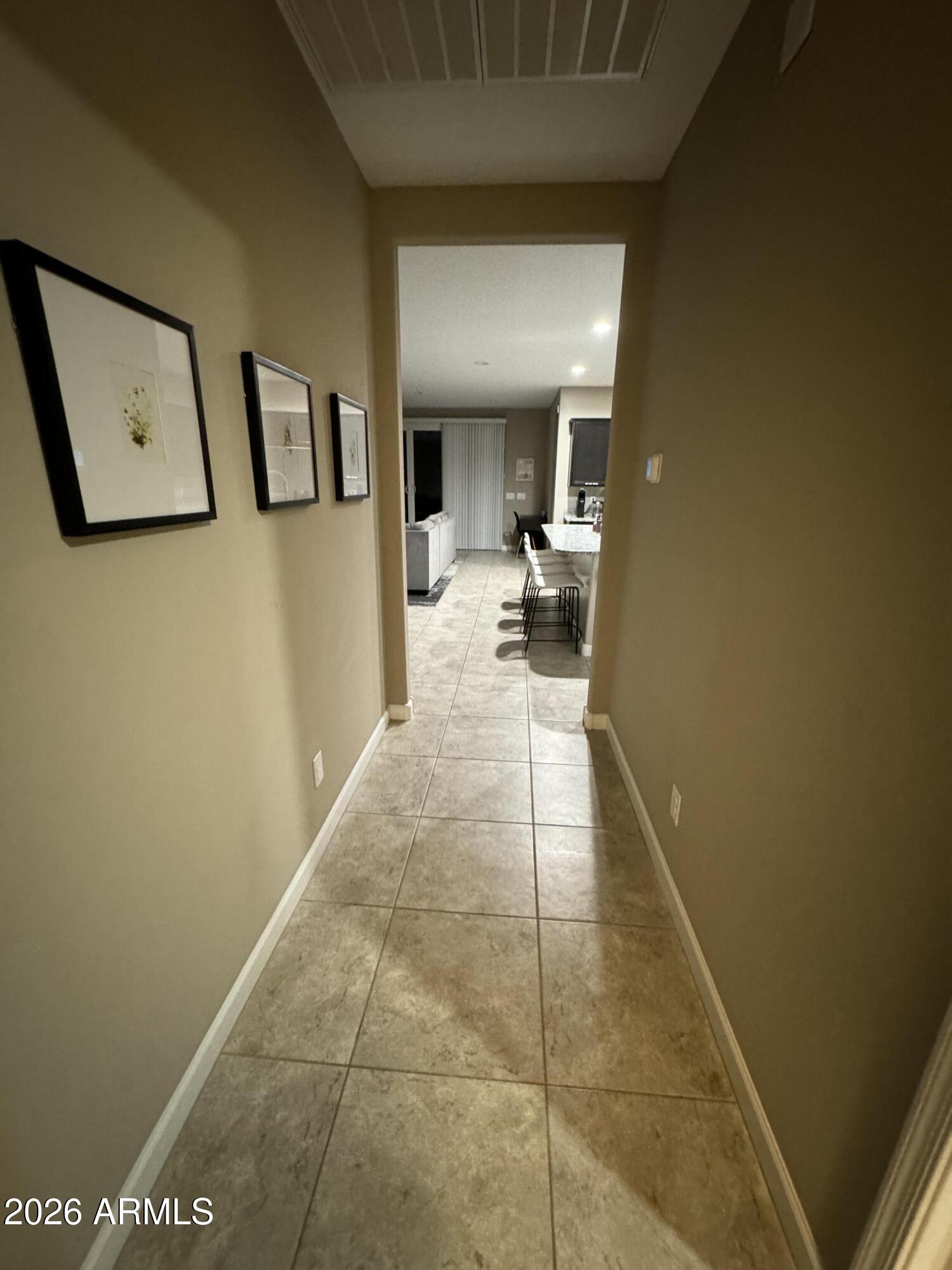 18735 North Ravello Road Maricopa, AZ 85138 - Photo 11 of 50 a hallway with a view of living room