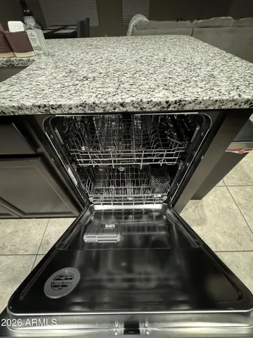 a room with lots of different colored cloths