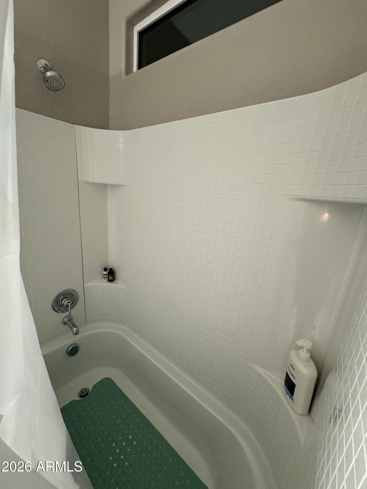 18735 North Ravello Road Maricopa, AZ 85138 - Photo 8 of 50 a bathroom with a tub and shower