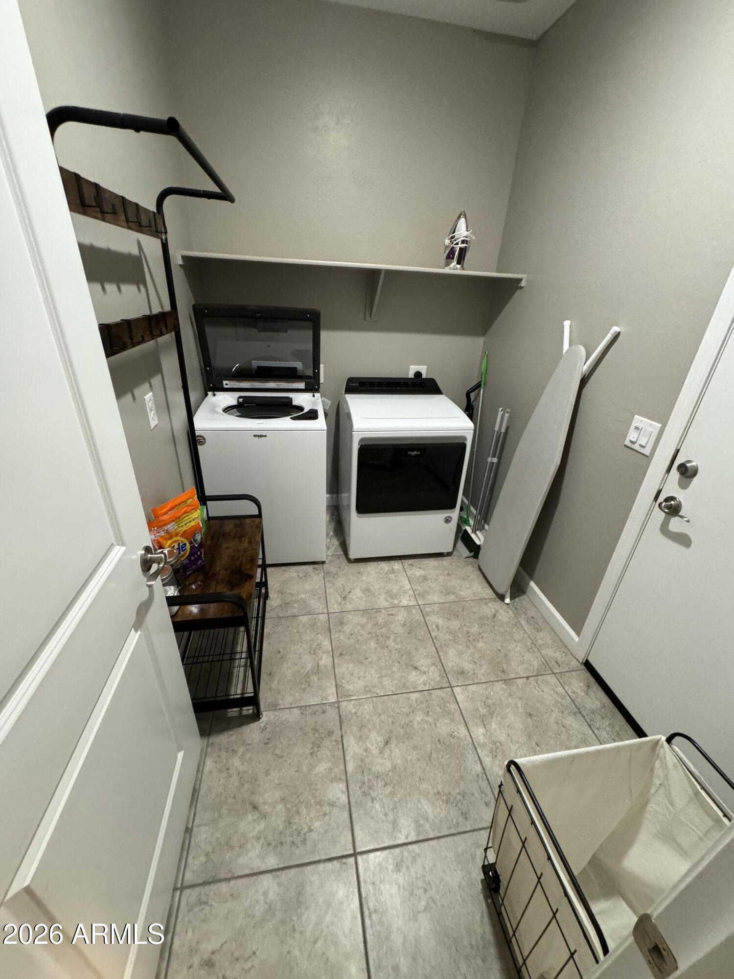 18735 North Ravello Road Maricopa, AZ 85138 - Photo 9 of 50 a living room with furniture