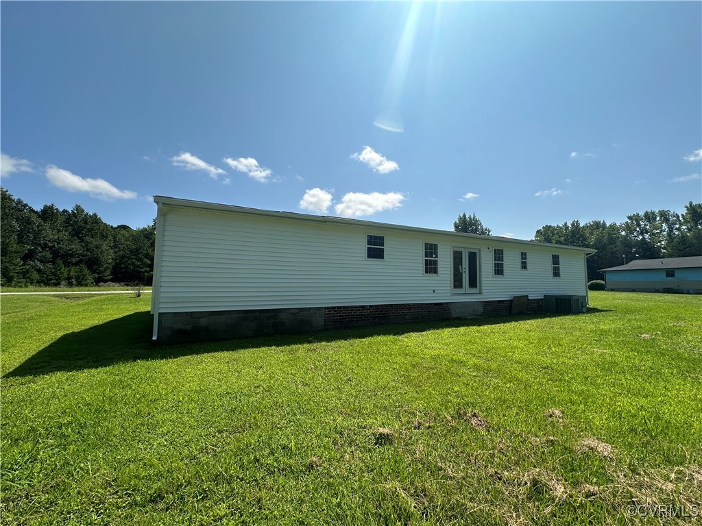 227 Horseshoe Road Jarratt, VA 23867 - Photo 14 of 14 a front view of a house with garden