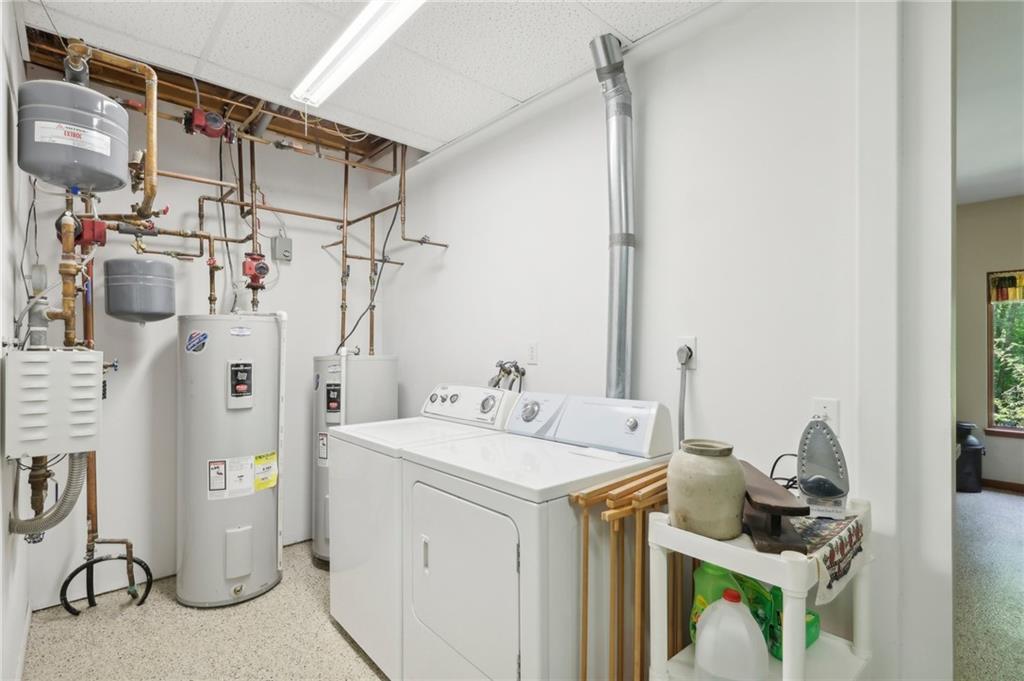 447 Creek Road Fredonia, PA 16124 - Photo 28 of 44 a utility room with dryer and washer