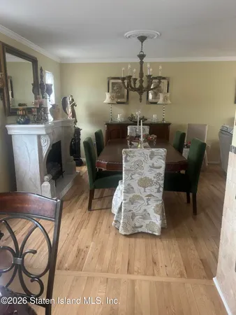 a bedroom with a bed and a mirror